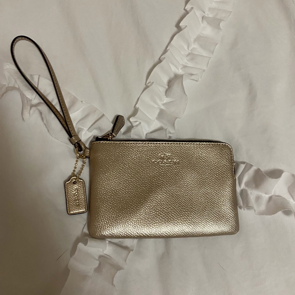 Coach Gold Wristlet with Tag Charm